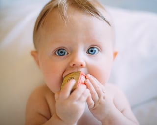 a young pediatric patient in a hospital bed