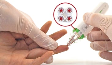 a hemapen device collecting a few drops of capillary blood from a finger