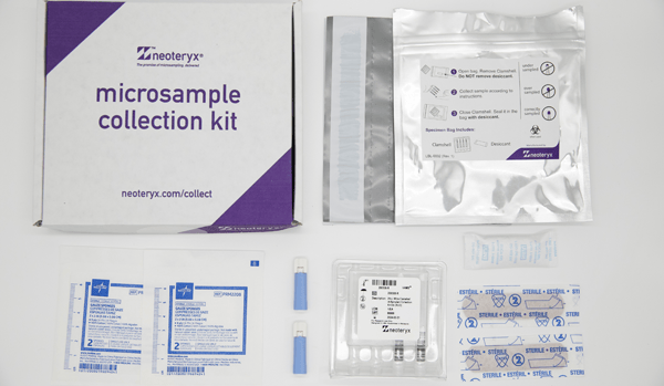 looking down a mitra blood collection kit, its various accessories are neatly placed around the box around