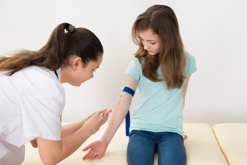 girl gets blood draw